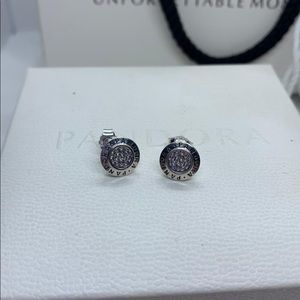 pandora sparkling  logo stud earrings. Ale 925 s